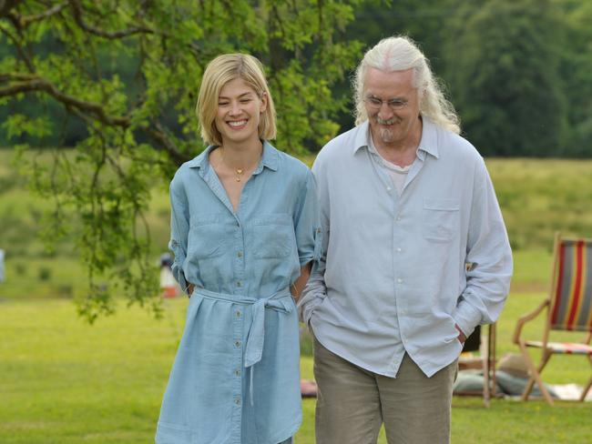 On set ... Rosamund Pike and Billy Connolly.