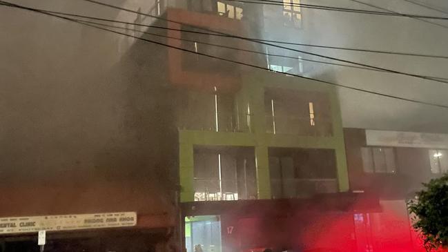 A restaurant fire led to heavy smoke and evacuations in Hopkins St, Footscray on February 21, 2023. Picture: @PeakHourImages/Twitter.