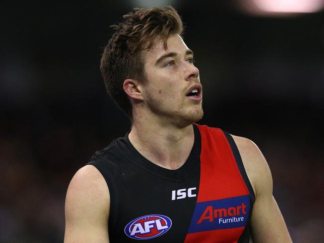 MELBOURNE, AUSTRALIA - AUGUST 10: Zach Merrett of the Bombers looks on during the round 21 AFL match between the Essendon Bombers and the Western Bulldogs at Marvel Stadium on August 10, 2019 in Melbourne, Australia. (Photo by Graham Denholm/Getty Images)