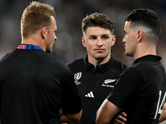 PARIS, FRANCE - SEPTEMBER 08: Sam Cane, Beauden Barrett and Will Jordan of New Zealand look dejected at full-time following the Rugby World Cup France 2023 Pool A match between France and New Zealand at Stade de France on September 08, 2023 in Paris, France. (Photo by Hannah Peters/Getty Images)