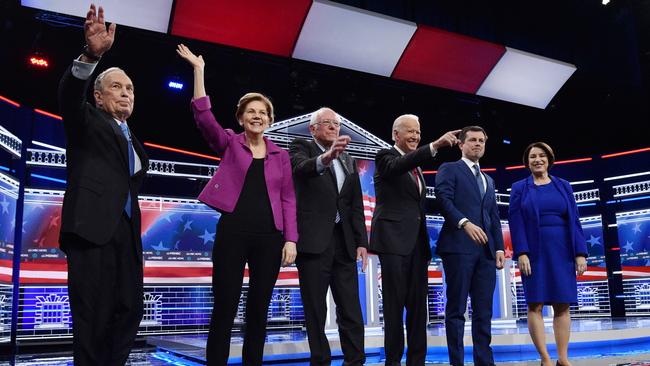 Former New York City Mayor Mike Bloomberg, Senator Elizabeth Warren, Senator Bernie Sanders, former Vice President Joe Biden, former South Bend Mayor Pete Buttigieg and Senator Amy Klobuchar gather onstage for the ninth Democratic 2020 US presidential candidates debate at the Paris Theater in Las Vegas. Picture: Reuters