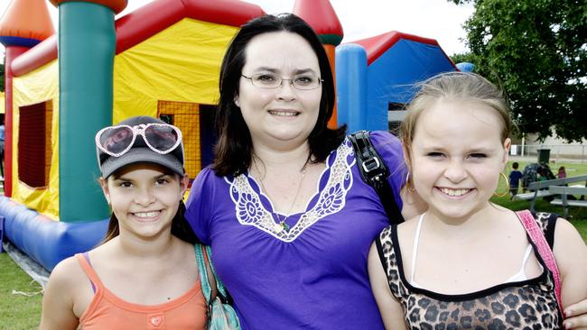 Megan Forbes with her two girls Taylah and Emily at the Ipswich Turf Club for New Year’s Eve in 2009. Picture: Sarah Harvey