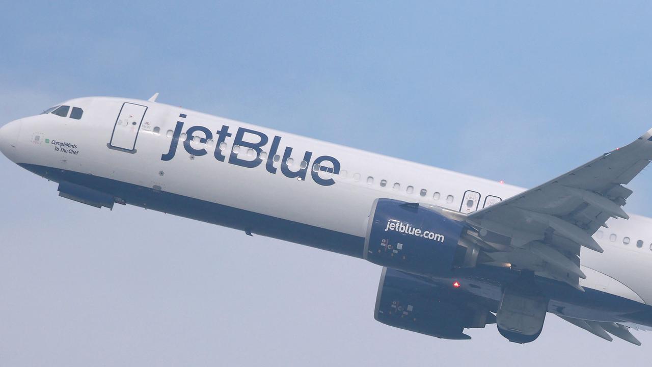 Two people have been found dead inside the landing gear of a JetBlue plane. Picture: Getty Images via AFP.