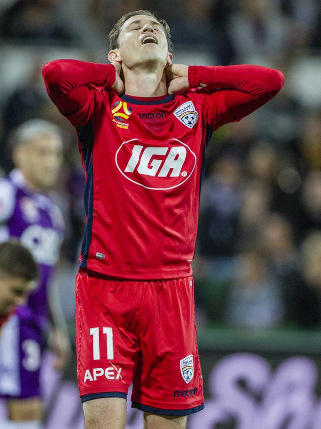 Craig Goodwin of Adelaide United reacts to missing a shot on Glory's goal during the A-League Semi Final. Picture: AAP Image/Tony McDonough