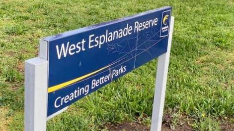 A damaged sign at the entrance of West Esplanade Reserve in St Albans, which residents say has become a hub for drug crime. Picture: supplied