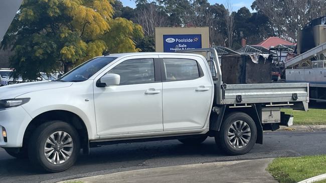 Limited items were able to be retrieved from the building fire, with the only known object being a metal safe that was taken on the back of a ute. Picture: Jack Colantuono