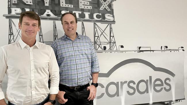 Brazil’s Webmotors chief executive Eduardo Jurcevic with Carsales chief executive Cameron McIntyre, right, after the pair announced a $353m deal.