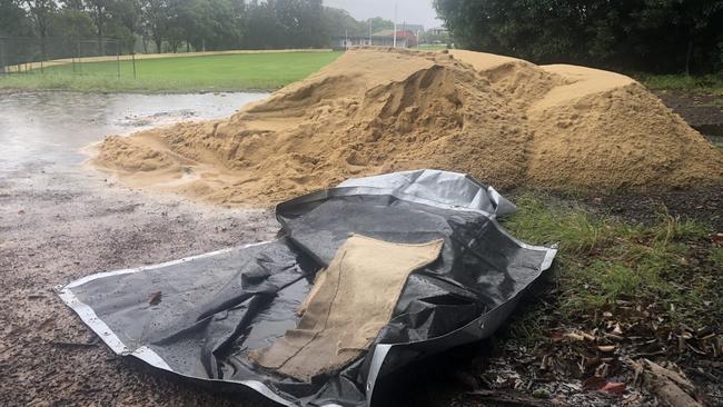 Northern Beaches Council and the SES provided free sand and sandbags at three locations on Friday, including the Balgowlah Golf Club car park (pictured), to help residents protect their properties against potential flooding. Picture: Jim O’Rourke