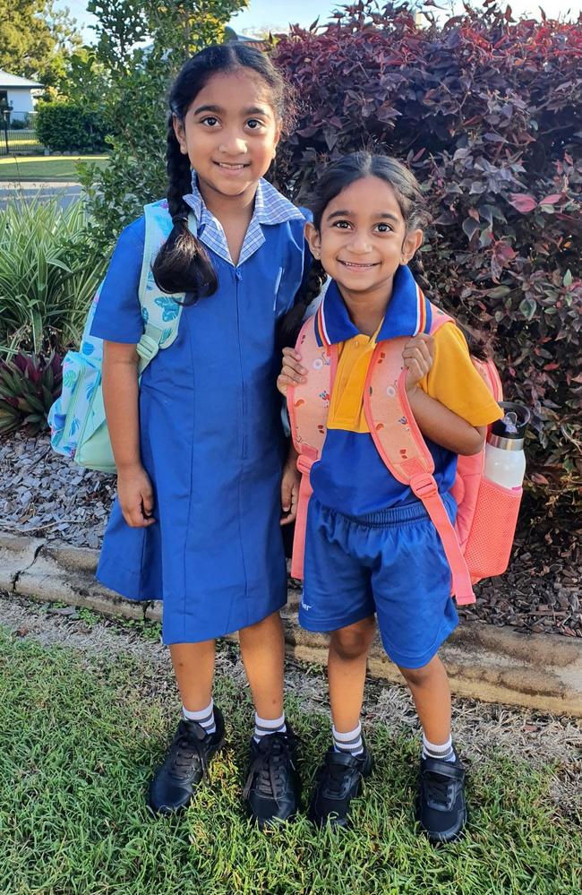 Kopika, 7, and Tharnicaa, 5, on their first day of school in Biloela. The Nadesalingam family are former asylum seekers who were in detention for more than four years before being granted permanent residency.