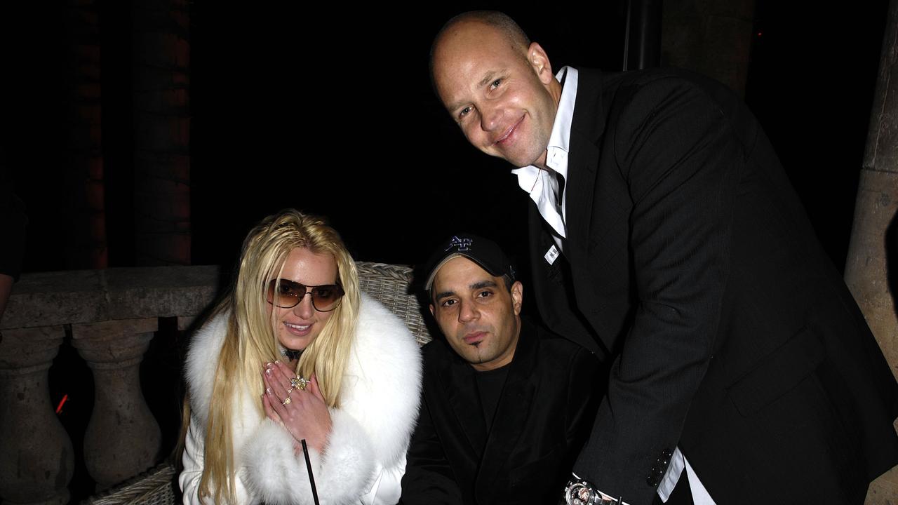 Britney Spears celebrates her birthday with Sam Lutfi and designer Ole Lynggaard in 2007. Picture: Toby Canham/Getty Images