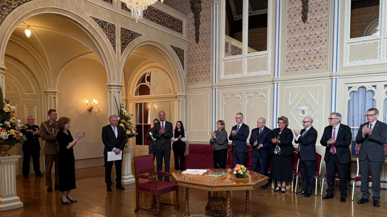 Her Excellency, Tasmanian Governor Barbara Baker, leads applause to congratulate the Chief Justice and Lieutenant Governor. Picture: Government House