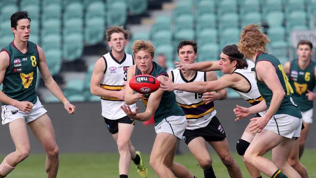 NAB League, Tasmanian Devils William Peppin handballs during the game against the Murray Bushrangers at UTAS Stadium. Picture: CHRIS KIDD