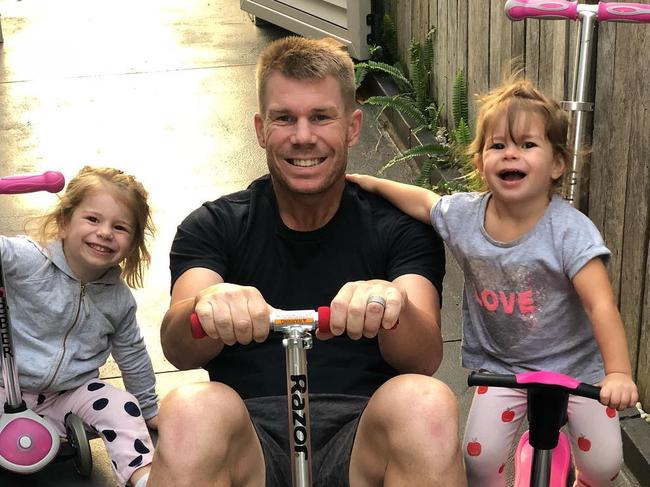 Doting dad David Warner.