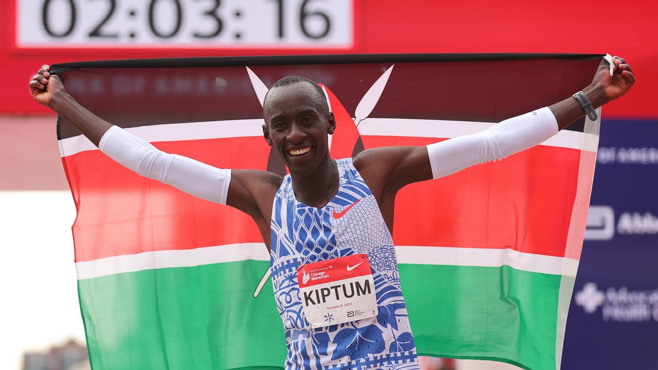 CHICAGO, ILLINOIS - OCTOBER 08: Kelvin Kiptum of Kenya celebrates after winning the 2023 Chicago Marathon professional men's division and setting a world record marathon time of 2:00.35 at Grant Park on October 08, 2023 in Chicago, Illinois. (Photo by Michael Reaves/Getty Images) *** BESTPIX ***