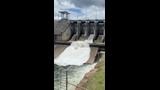 WATCH: The moment Wivenhoe Dam spilled over | The Courier Mail