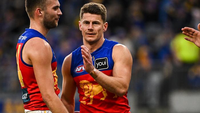 PERTH, AUSTRALIA - JULY 14: Dayne Zorko of the Lions celebrates the win at the siren during the 2024 AFL Round 18 match between the West Coast Eagles and the Brisbane Lions at Optus Stadium on July 14, 2024 in Perth, Australia. (Photo by Daniel Carson/AFL Photos via Getty Images)