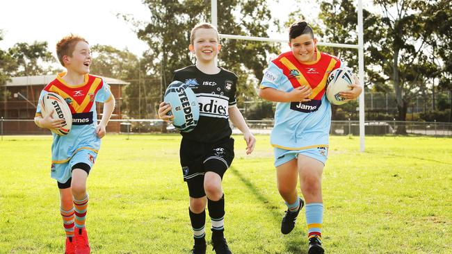 The wait is over for Jayden Hoban (middle), Zayne Armstrong (right) and Sunny Ganderton (left). Picture Rohan Kelly