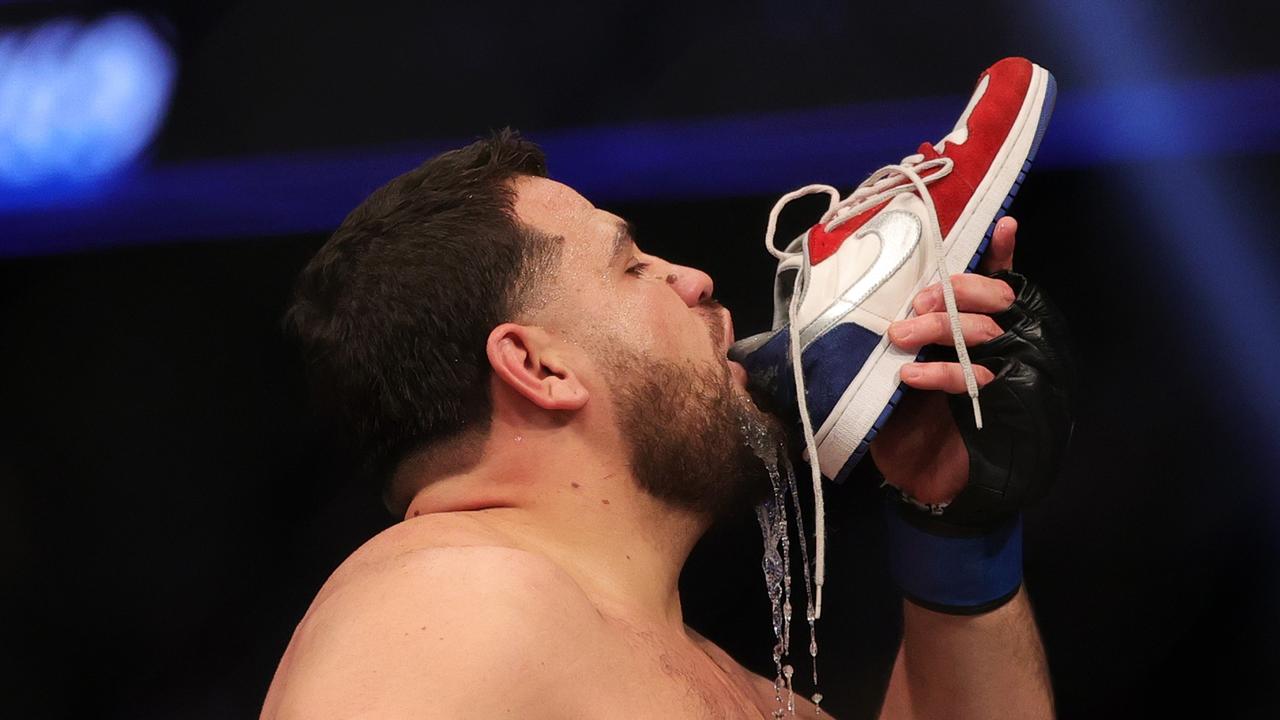 Tai Tuivasa down his signature shoey. Carmen Mandato/Getty Images/AFP