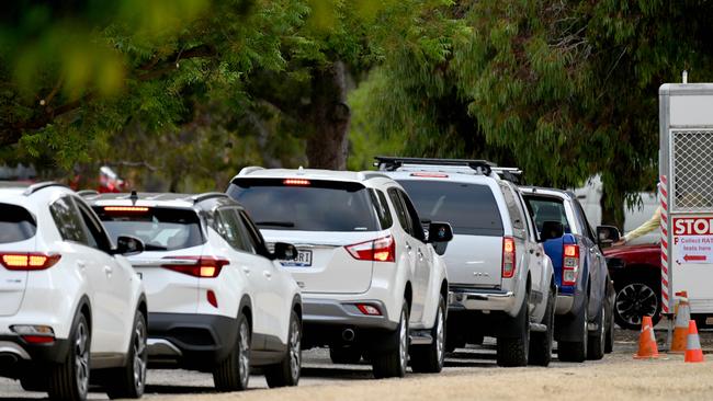 Queues formed at the rapid antigen test “supersite” at the Josie Agius Park/Wikaparntu Wirra, which opened at 7am on Thursday. Picture: Naomi Jellicoe.