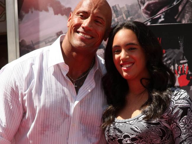 Proud papa ... Dwayne "The Rock" Johnson and daughter, Simone Alexandra Johnson. Picture: Splash