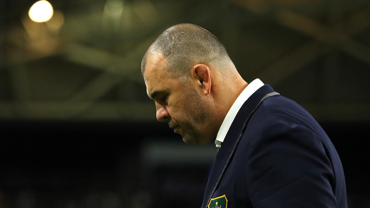 Michael Cheika looks dejected in defeat after the Rugby World Cup quarterfinal.