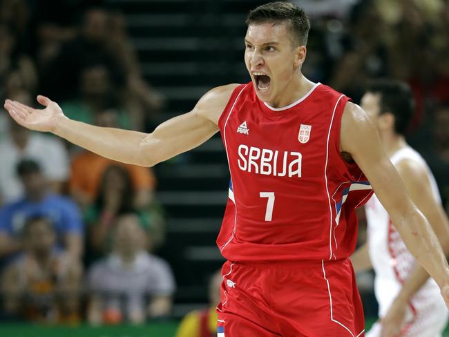 Serbia's Bogdan Bogdanovic celebrates after making a three-pointer v Croatia.