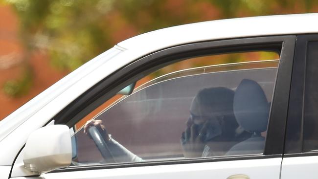 Another woman on the phone while driving. Picture: Evan Morgan