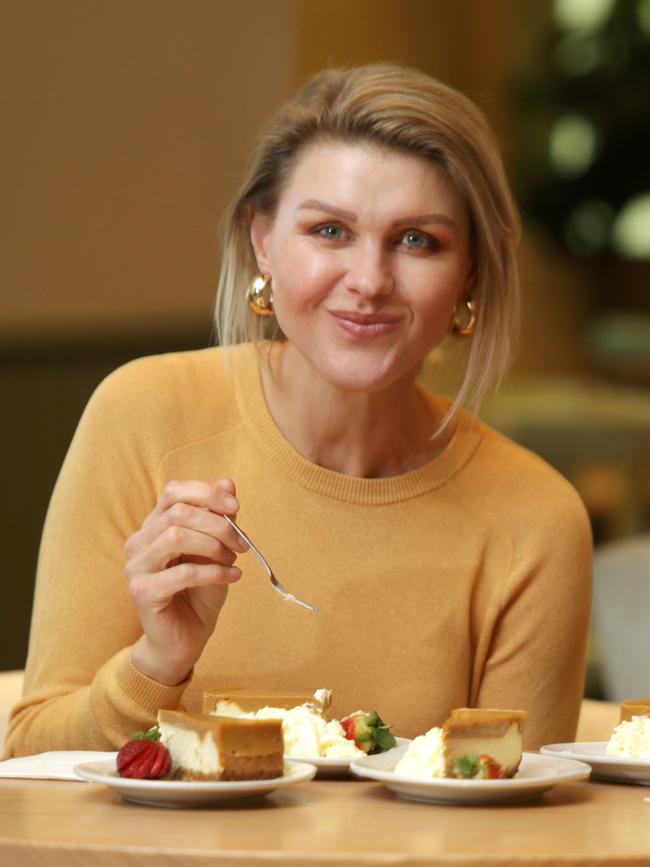 Courtney Roulston samples the Club Mudgee competition caramel cheesecake. Picture Dean Marzolla.