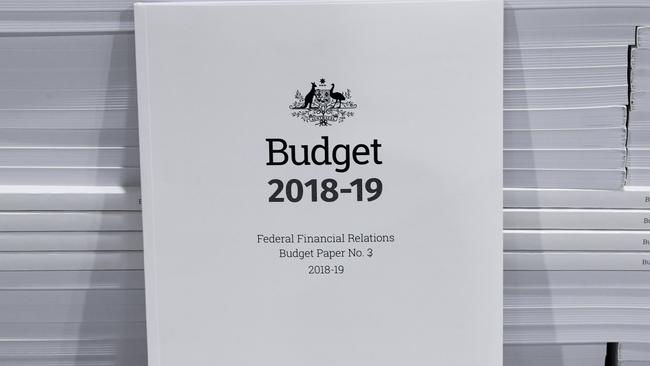 The cover of the 2018-19 Budget papers is seen at Canprint in Canberra, Sunday, May 6, 2018. Australia's Treasurer Scott Morrison will deliver his third Budget on Tuesday, May 8. (AAP Image/Lukas Coch) NO ARCHIVING