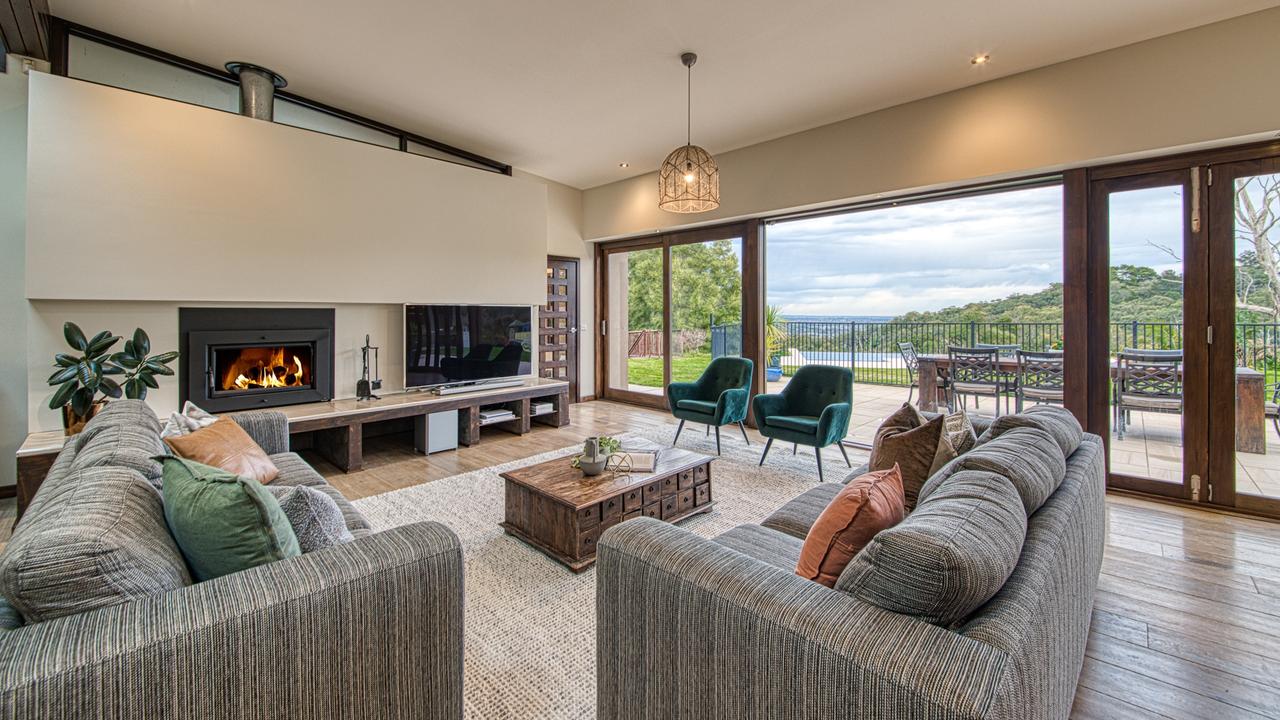 One of the living areas with a large open fireplace.