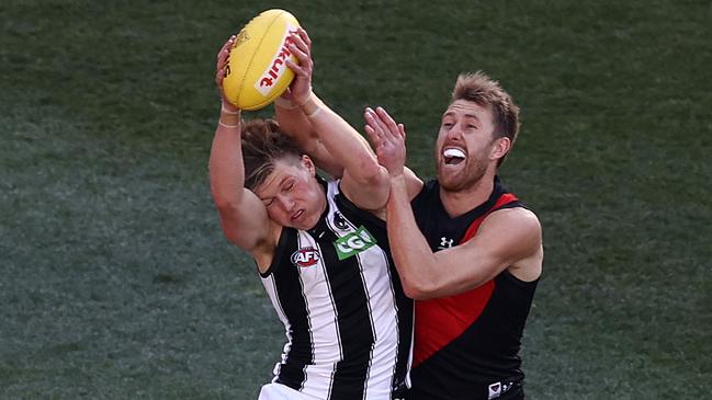 Rantall marks for the Magpies in front of Essendon’s Dyson Heppell during their round 23 match at the MCG last year. Picture: Michael Klein