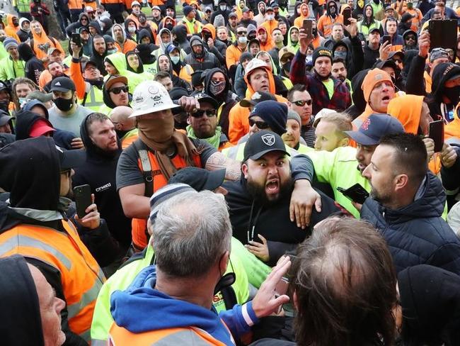 Violence erupts as CFMEU secretary John Setka speaks with angry construction workers at union headquarters. Picture: David Crosling