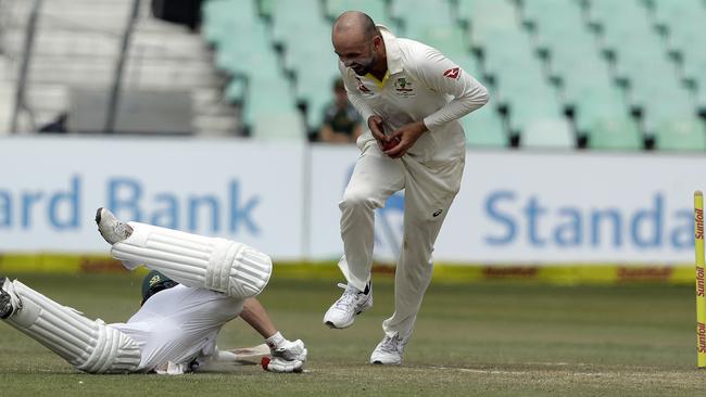 Nathan Lyon drops the cherry on AB de Villiers after running him out.