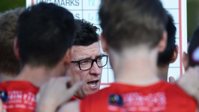 Hey boys, we are back in the finals. North Adelaide coach Josh Carr addresses players. Picture: Brenton Edwards/AAP