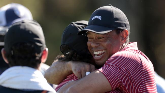 It’s often you see Tiger crack a smile like that. (Photo by Douglas P. DeFelice/Getty Images)