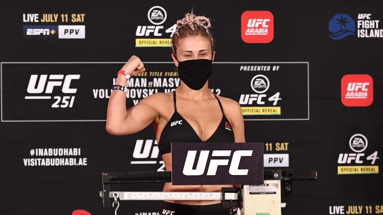 Paige VanZant poses on the scale during the UFC 251 official weigh-in. (Photo by Jeff Bottari/Zuffa LLC via Getty Images)