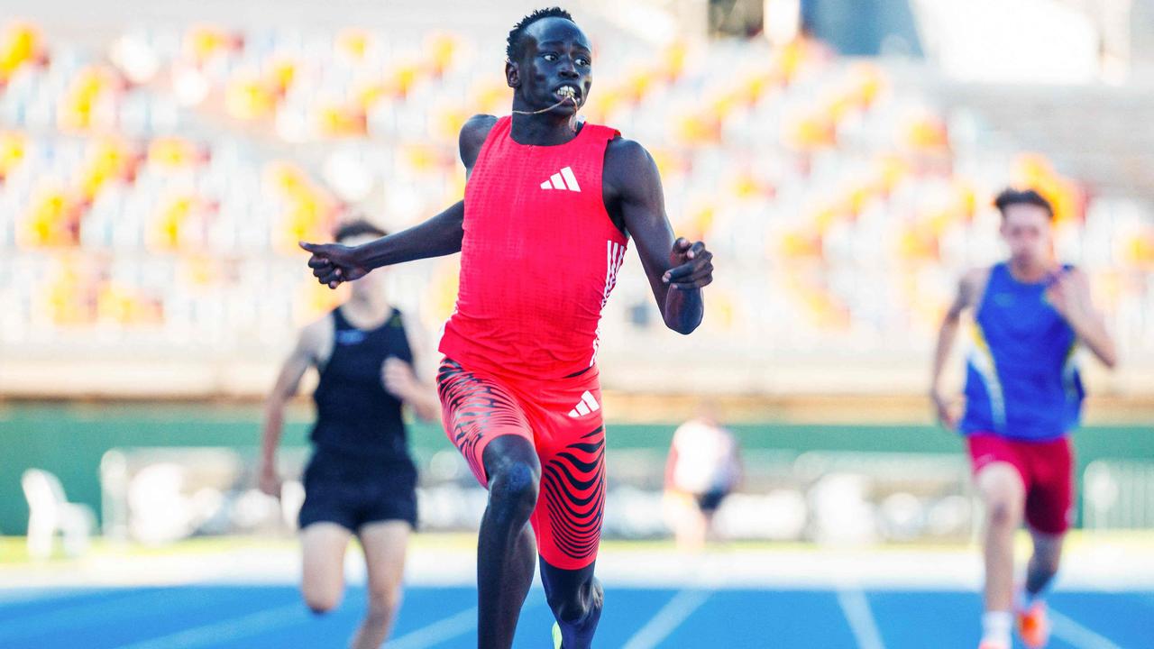 Australia's Gout Gout wins the men's 200m final during the Queensland State Championships in Brisbane on Sunday. (Photo by Patrick HAMILTON / AFP)