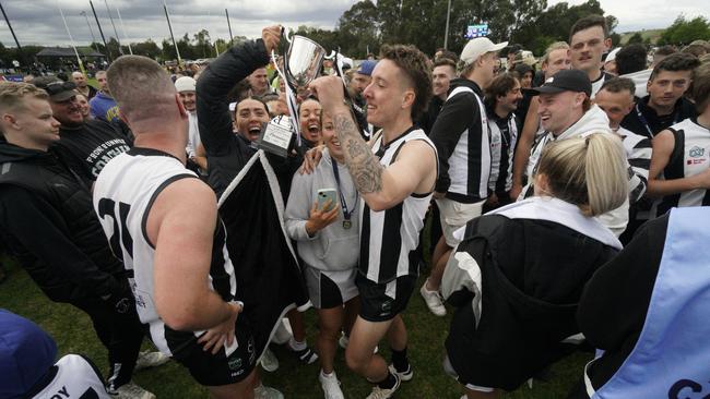 Narre Warren players celebrate their premiership victory. Picture: Valeriu Campan