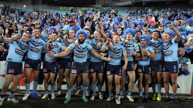 NSW players get the party started, celebrating victory in the State of Origin series after defeating Queensland in game two at Sydney’s ANZ Stadium last night. Picture: Brett Costello