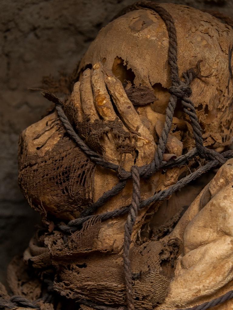 The mummy was discovered with hands over its face. Picture: UNMSM/Facebook