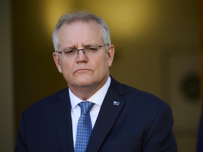 CANBERRA, AUSTRALIA - AUGUST 23: Australian Prime Minister Scott Morrison discusses the Government's plan to 'live with the virus' during a press conference at Parliament House on August 23, 2021 in Canberra, Australia. Federal parliament has resumed in Canberra, despite the ACT being in lockdown due to growing COVID-19 cases. NSW and Victoria are also currently in lockdown as health authorities work to contain the spread of the highly contagious Delta strain of the coronavirus. (Photo by Rohan Thomson/Getty Images)