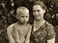 Vladimir Putin in 1958 as a child with his mother, Maria Ivanovna Putina.