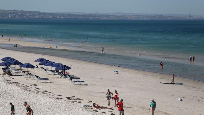 People are being warned about stormwater run-off at beaches such as Henley Beach (pictured).