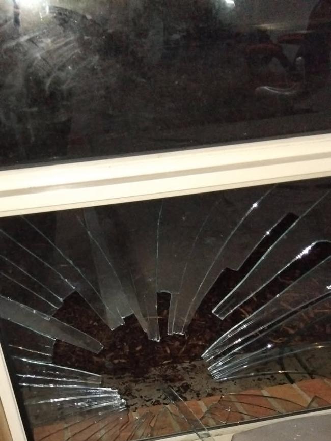 Smashed windows inside the Hillcrest home show the damage left behind after armed intruders crashed a formal after-party on May 16. Picture: Supplied