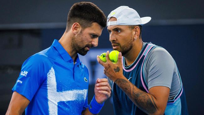 Novak Djokovic and Nick Kyrgios during their doubles match at the Brisbane International. Picture: AFP