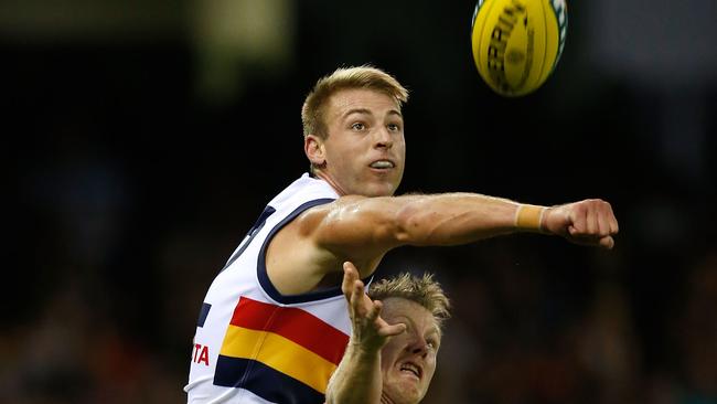 MELBOURNE, AUSTRALIA - APRIL 9: Daniel Talia of the Crows and Jack Riewoldt of the Tigers in action during the 2016 AFL Round 03 match between the Richmond Tigers and the Adelaide Crows at the Etihad Stadium, Melbourne on April 9, 2016. (Photo by Michael Willson/AFL Media/Getty Images)