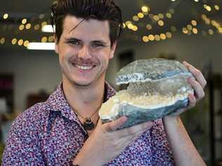 Michael Boon holding an Okenite and Apophyllite Cave which was found in India. Picture: Mike Knott