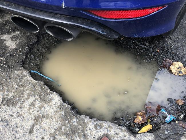 One of the larger pot holes at the car park. Picture: Lawrence Machado