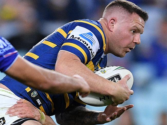 Nathan Brown of the Eels is tackled by Jeremy Marshall-King of the Bulldogs during the Round 19 NRL match between the Parramatta Eels and the Canterbury-Bankstown Bulldogs at ANZ Stadium in Sydney, Thursday, July 19, 2018. (AAP Image/Dan Himbrechts) NO ARCHIVING, EDITORIAL USE ONLY