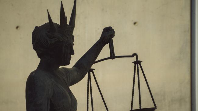 BRISBANE , AUSTRALIA - NewsWire Photos - BRISBANE , JUNE 24 2024: Generic photo of the scales of justice stature outside Brisbane Supreme Court in the Brisbane CBD. Picture: NewsWire / Glenn Campbell